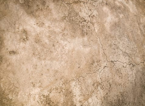 old plastered wall with cracks as background