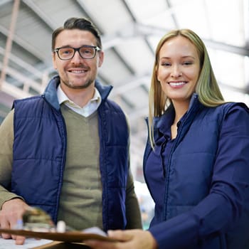 Warehouse, portrait and people with clipboard for transport, inventory and boxes for shipping. Colleagues, teamwork and collaboration on import or export, factory and papers for logistics on delivery.