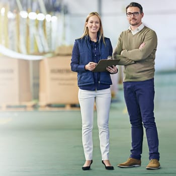 Warehouse, portrait and people with clipboard for cargo, inventory and boxes for shipping. Colleagues, teamwork and collaboration on import or export, factory and paperwork for logistics on delivery.