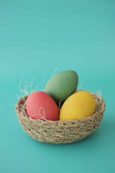 easter concept with egg on pink background..