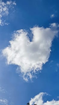 Blue gray light sky nature white clouds whether background, sun face . High quality photo
