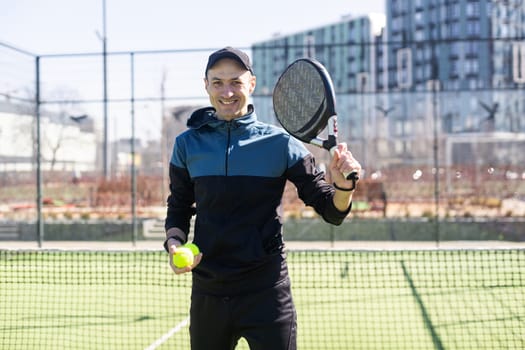 man playing paddle tennis at indoors pitch. High quality photo