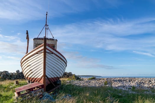 Old fishing vessel on dry land in County Donegal, Ireland.