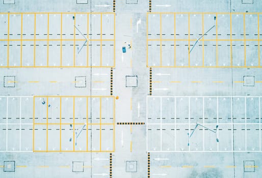 Aerial top down shot of an empty car parking lot