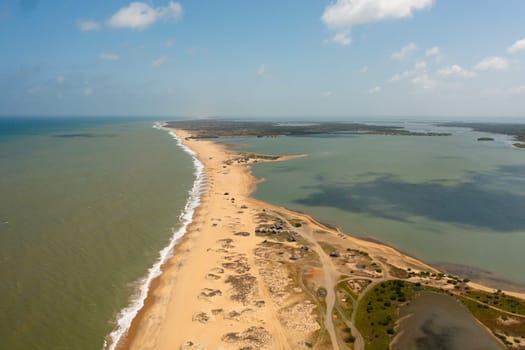 Tropical landscape with beautiful sandy beach and blue sea. Kalpitiya, Sri Lanka.