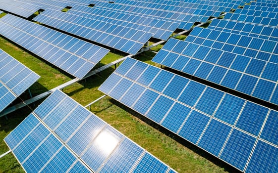 Aerial view of Solar Panels Farm Solar Cell Station. Production of clean energy. Renewable green alternative energy concept.