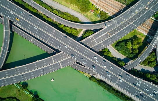 Aerial drone view of highway multi-level junction road with moving cars. China. The concept of the urban.