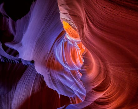 Bright hues of orange,magenta , yellow and blue come alive at Antelope Canyon, Arizona