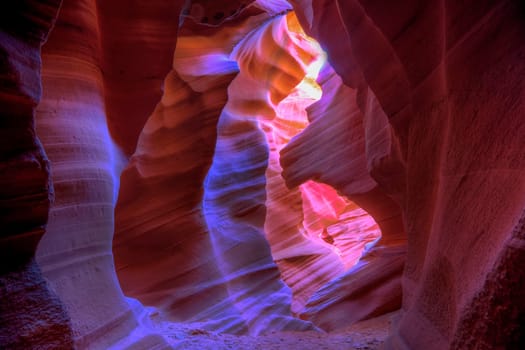 Bright hues of orange,magenta , yellow and blue come alive at Antelope Canyon, Arizona