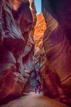 Hikers in Buckskin Gulch at Vermilion Cliffs National Monument, Utah