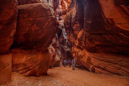 Hikers in Buckskin Gulch at Vermilion Cliffs National Monument, Utah