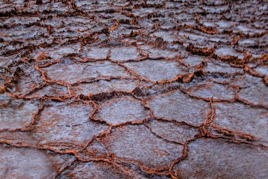 The salt flats at sunset at Badwater Basin at Death Valley National Park, California