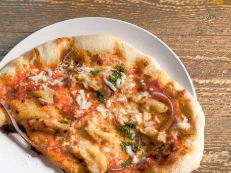 Top view of barbeques chicken pizza