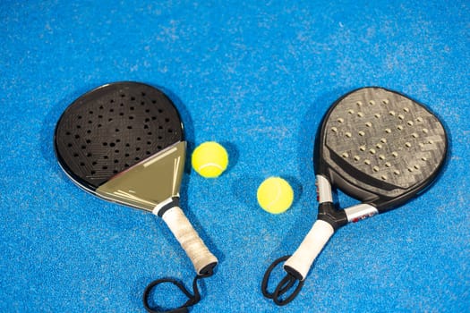 padel tennis racket sport court and balls . High quality photo