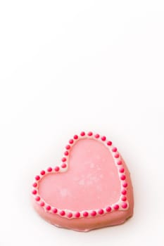 Gourtmet heart shaped cookies decorated for Valentine's Day.