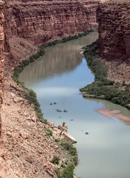 Rafters make their way down the Colorado River at Lee's Ferry, Arizona