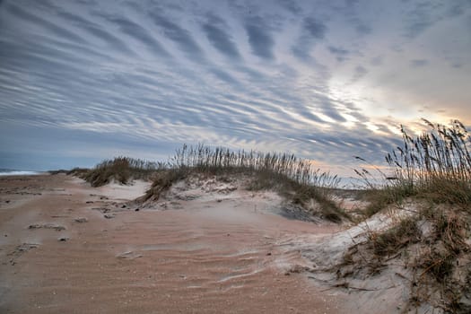 Sand Dunes and Ocean Waves make up the scene at Cape Hatteras National Seashore, North Carolina