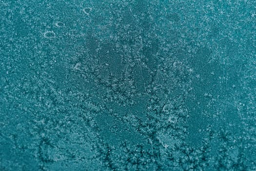 Frozen window. Texture, background for inserting text. New Year theme.