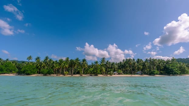 Beautiful tropical beach and sea with coconut palm tree in paradise island