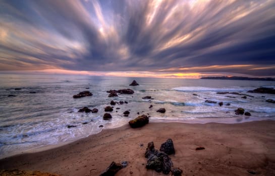 The sun sets along the California Pacific Coastline