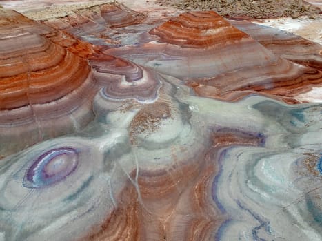 The Bentonite Hills near Hanksville, Utah, provide colorful and unusual geologic patterns in the landscape.