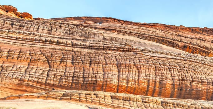 Unusual sandstone rock formation produced through erosion are the feature at The Wave at Coyote Buttes North  in the Vermilion Cliffs National Monument, Arizona