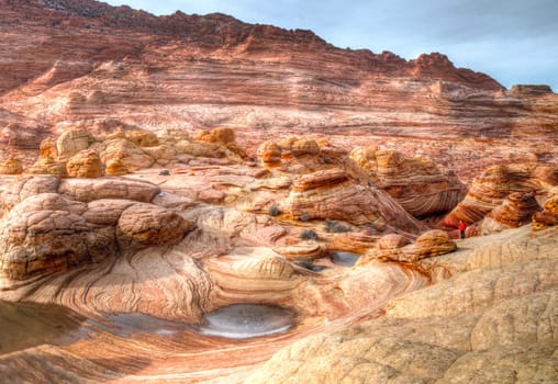 Unusual sandstone rock formation produced through erosion are the feature at The Wave at Coyote Buttes North  in the Vermilion Cliffs National Monument, Arizona