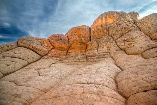 Unusual rock formations produced through millions of years of erosion form the landscape at White Pocket at Vermilion Cliffs National Monument, Arizona