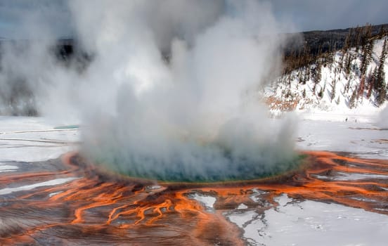 The colorful Grand Prismatic Spring during winter at Yellowstone National Park, Wyoming