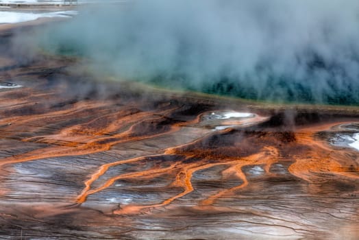 The colorful Grand Prismatic Spring during winter at Yellowstone National Park, Wyoming