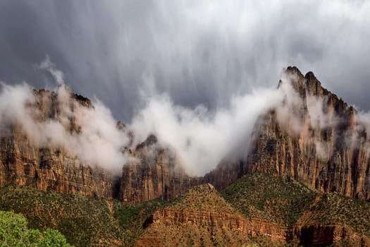 Fog rolls into Zion Canyon after a rainstorm at Zion National Park, Utah