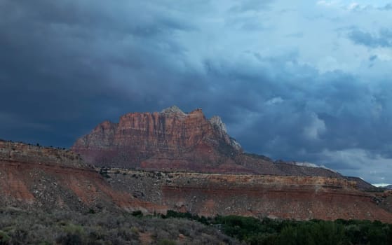 Dark clouds from a seasonal monsoon have appeared at Zion National Park, Utah