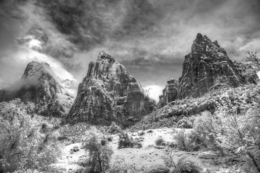 Fresh snow has fallen at the Court Of The Patriarchs  in Zion Canyon at at Zion National Park, Utah