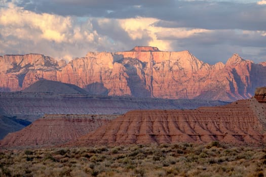 The towering sandstone canyon walls lead to the West Temple at Zion National Park, Utah