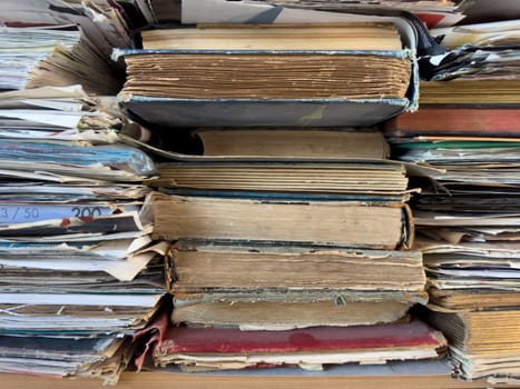 texture a stack of books lies on the table