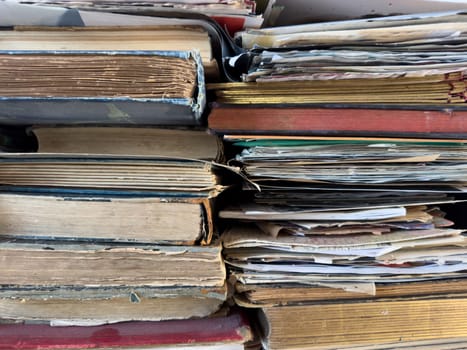 texture a stack of books lies on the table