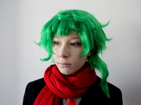 teenage girl with green hair and green eyes in a red scarf, cosplay of the anime character Midori.