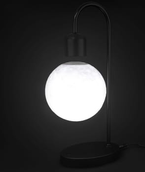 levitating ball lamp on black background
