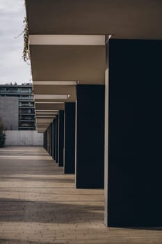 Concrete columns of modern residential high rise building or office, perspective view