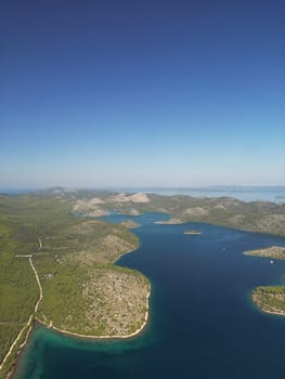 Drone aerial epic view of islands covered with green forest in Telascica bay, National Park, Croatia