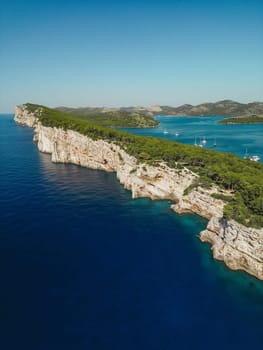 Drone aerial view of sea waters and Mir lake on Dugi Otok island, Telascica National Park, Croatia