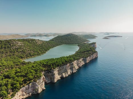 Aerial view of Telascica Nature Park with cliffs and forest, Mir salt lake, Croatia