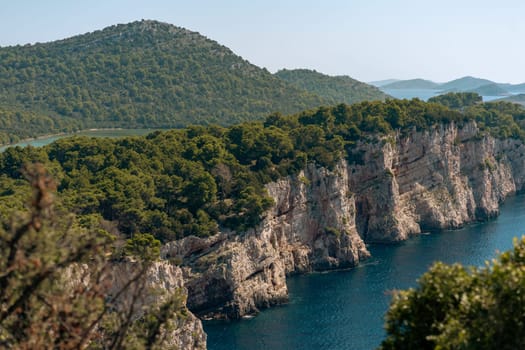 Aerial panorama view of cliffs near Salty lake and mountains in Dugi Otok island picturesque nature of Telascica National Park, Croatia
