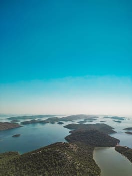Drone aerial view of Telascica bay in National Park, Croatia. Croatian beautiful islands in Adriatic Sea under bright blue sky