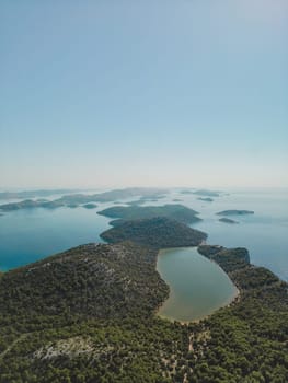 Drone aerial view of Telascica bay with small islands group and lake in National Park, Croatia