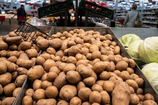 Potatoes In Vegetable Section Of Grocery Supermarket Are Fresh And Affordable