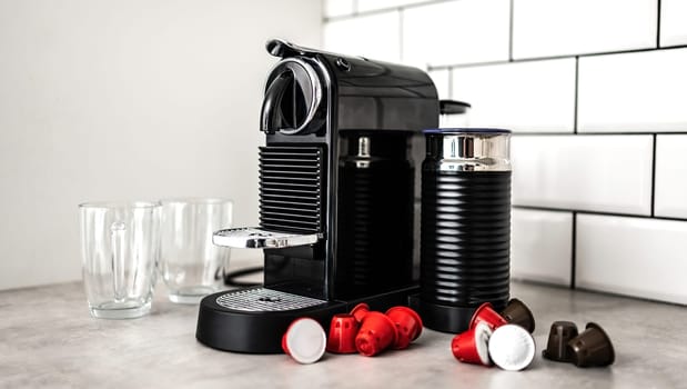 Coffee machine with capsules at domestic kitchen at home. Espresso caffeine beverage maker for energetic morning