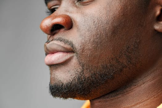 Close-Up of African Mans Lower Face and Lips studio shot