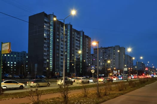 Moscow, Russia - Nov 21. 2023. Evening traffic on the Kamenka street in Zelenograd