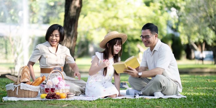 Grandparents enjoying with granddaughter in park and serenity. They are having joyful and cheerful time together. Loads of smile and happy moment.